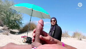 I overwhelmed this muslim by pulling my beef whistle out on the public beach, OMG her spouse will be here shortly