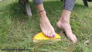 Feet crush cake on the lawn - sexy pink toe nails and sticky toes