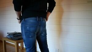 Trying on tight jeans