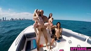 Stunning teens in sexy bikinis fucked on a boat outdoor