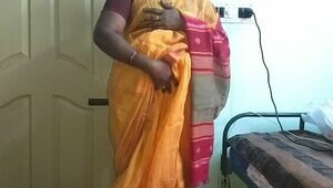 desi  indian naughty tamil telugu kannada malayalam hindi hotwife wifey vanitha wearing orange colour saree  flashing large bosoms and bald puss press rigid bosoms press nipple pawing puss onanism
