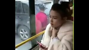 Chinese girl kissed. In bus .